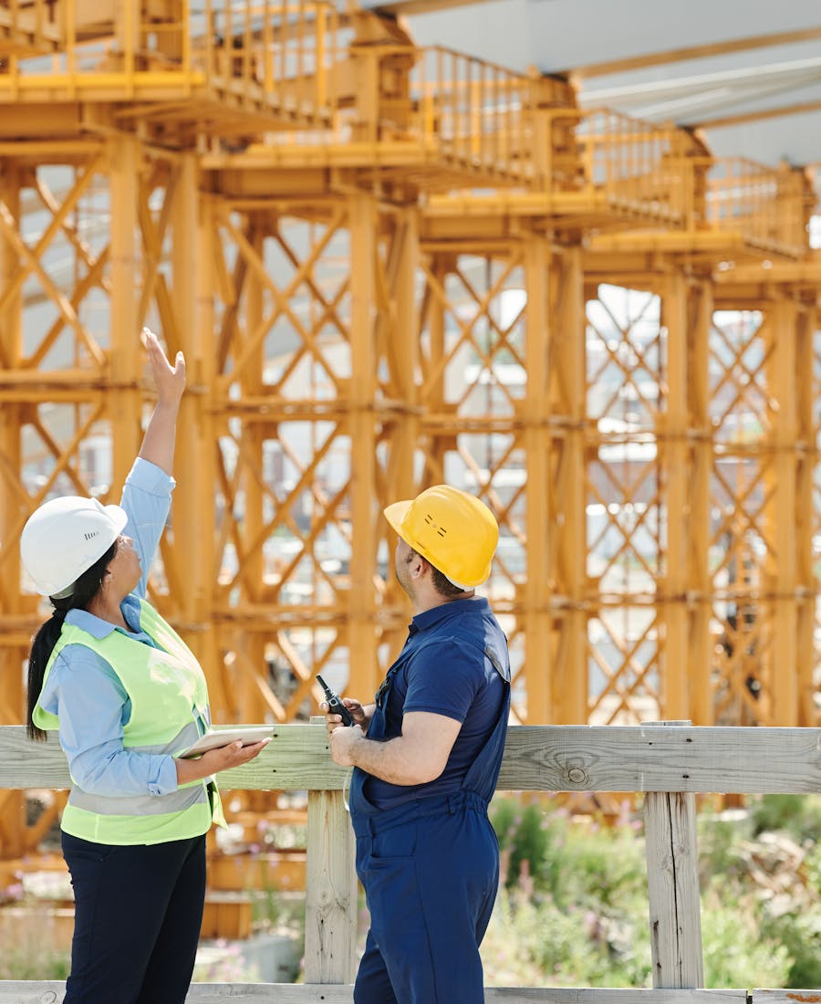Tradie reviewing plans on site